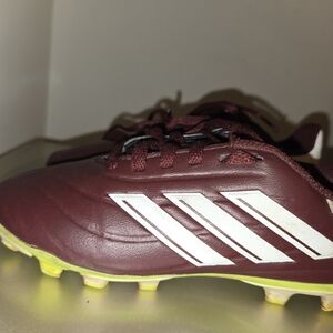 adidas Burgundy Soccer Cleats with White Stripes and Neon Yellow Sole